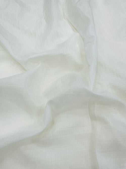 Close-up of white mul chanderi fabric with soft folds