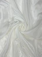 Close-up of white glass organza fabric with a glass silk like texture