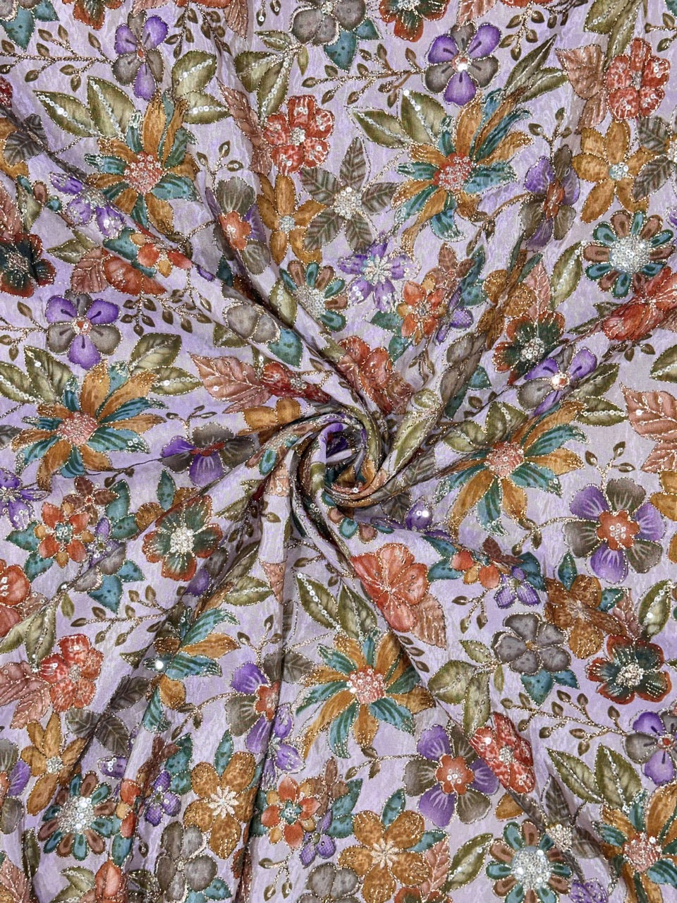 Close-up of floral fabric with a swirl pattern